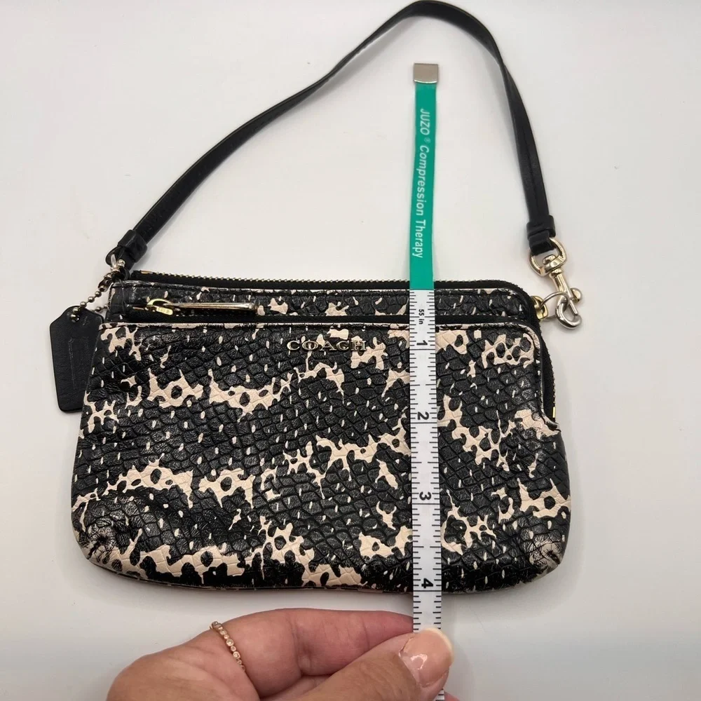 Coach Black and Cream Textured Wristlet